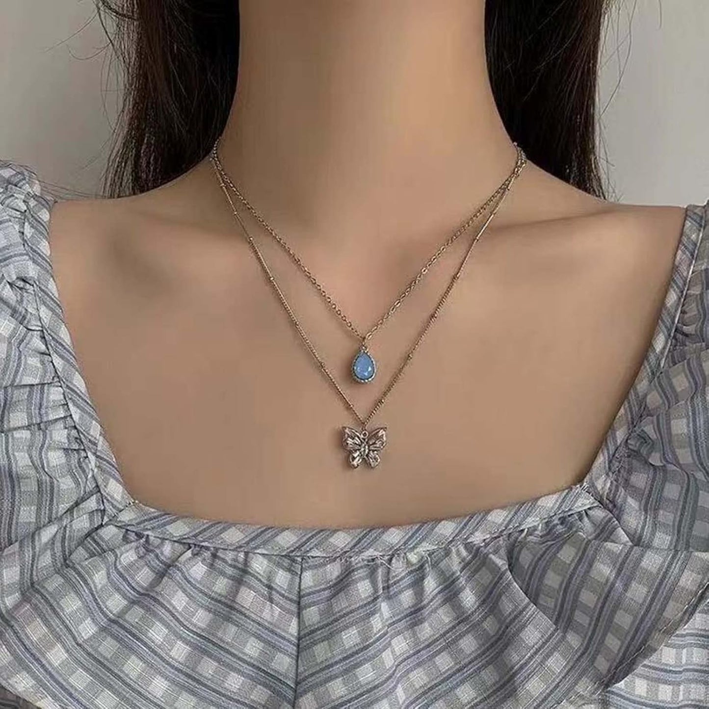 Silver Double-Layered Butterfly and Blue Gem Pendant Necklace
