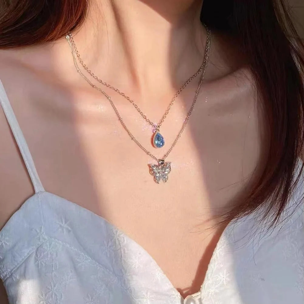Silver Double-Layered Butterfly and Blue Gem Pendant Necklace
