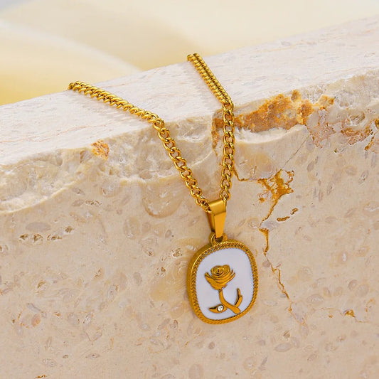 Elegant Golden Rose Pendant Necklace with White Enamel Base