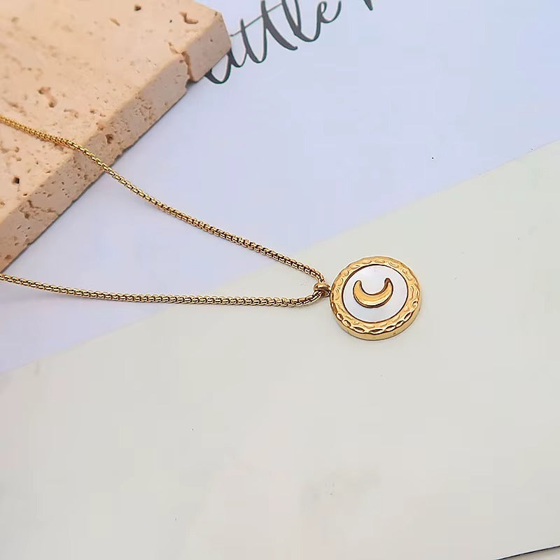 Golden Crescent Moon Pendant Necklace with Textured Frame