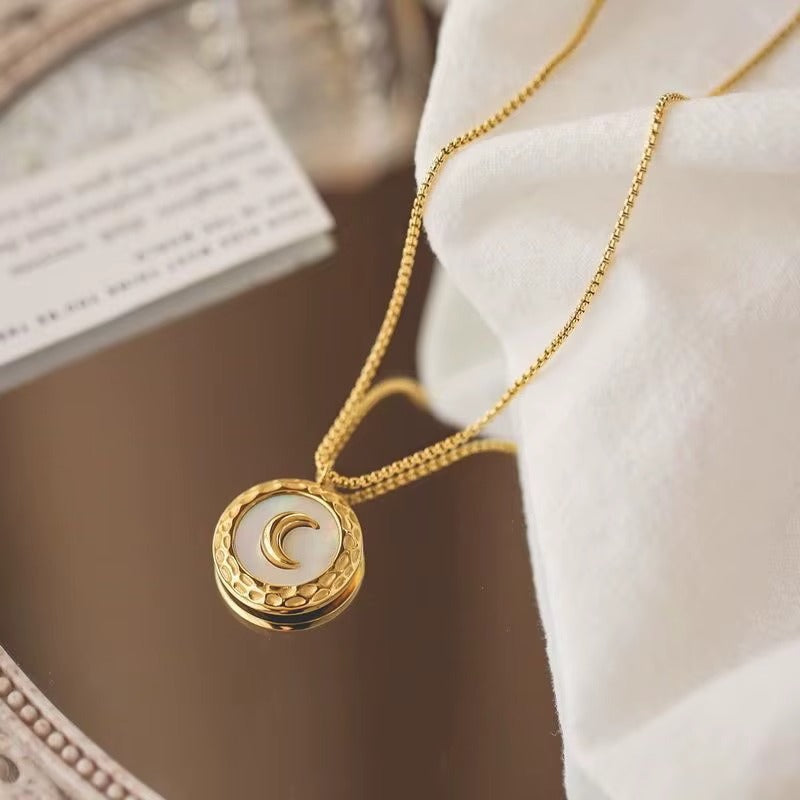 Golden Crescent Moon Pendant Necklace with Textured Frame