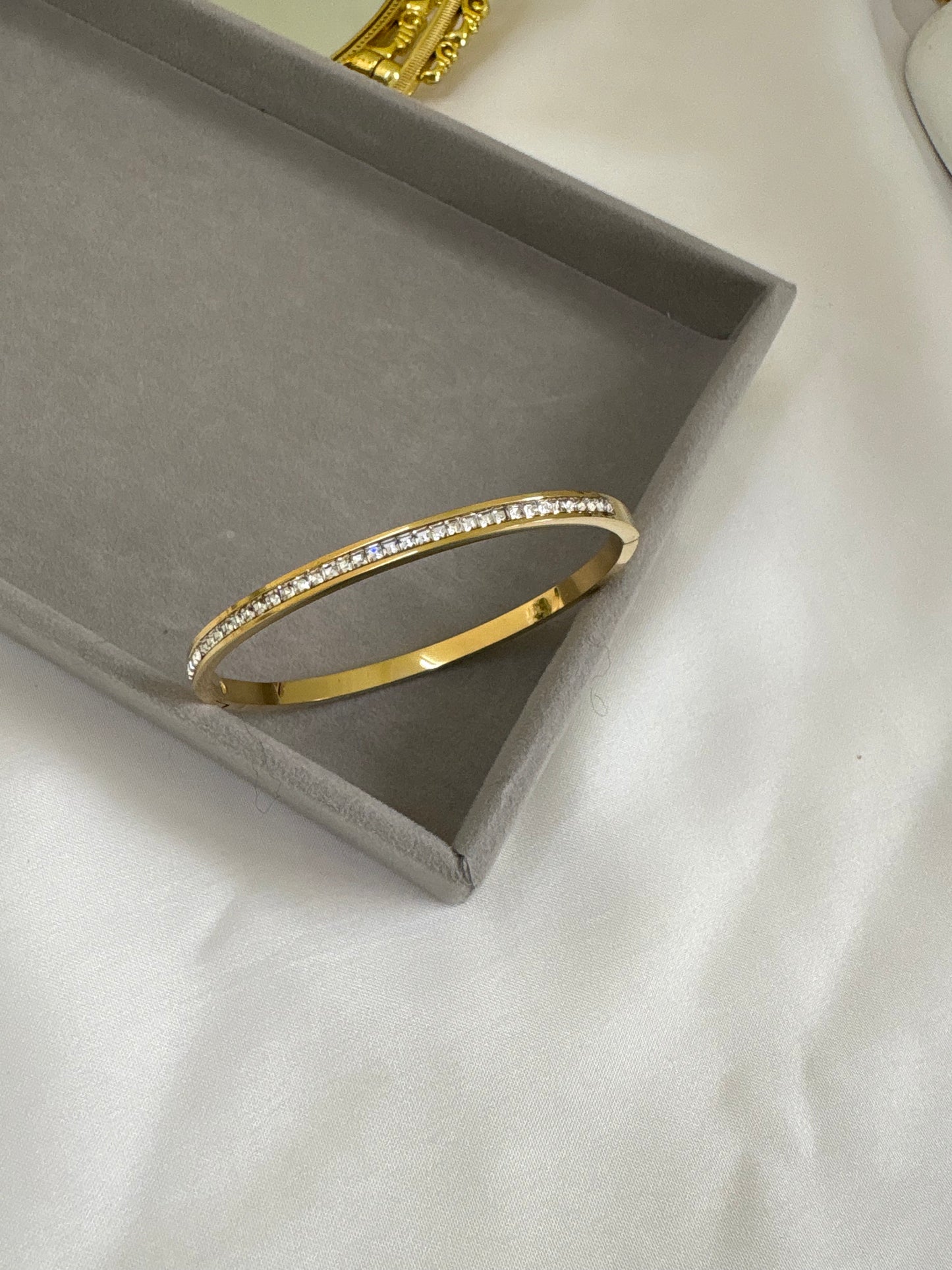 Gold-Plated Bangle Bracelet with Sparkling Cubic Zirconia