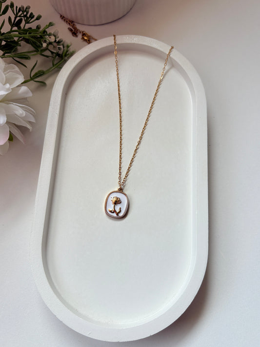 Elegant Golden Rose Pendant Necklace with White Enamel Base
