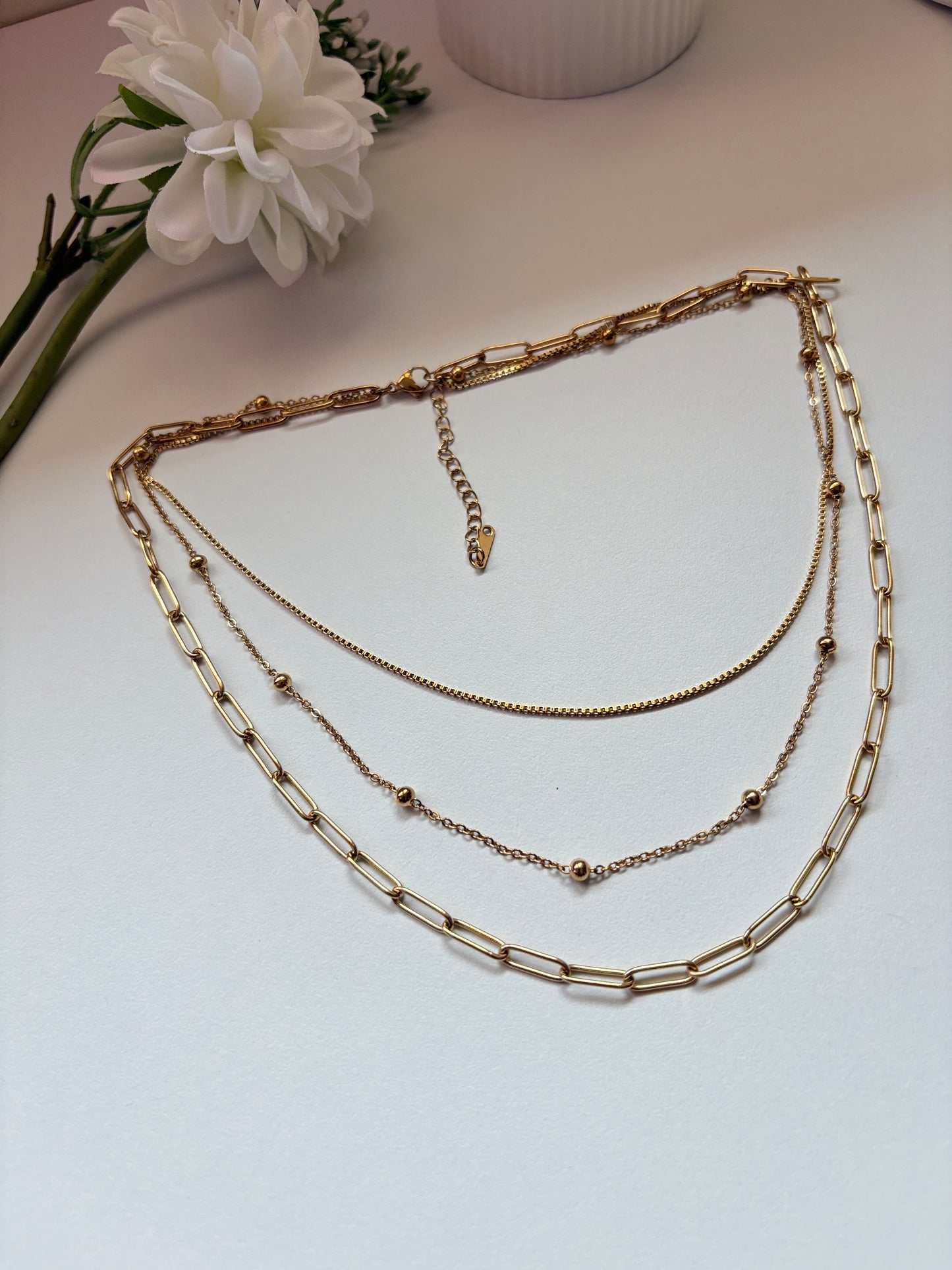 Multi-Layer Golden Chain Necklace with Textured Links and Bead Detailing