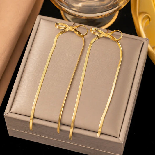 Elegant Long Bow Drop Earrings in Gold